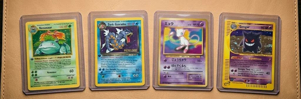 Pokémon Trading Card Game cards being examined for condition grading
